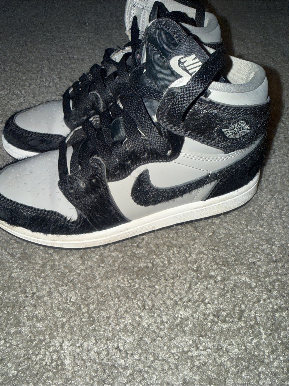 Nike Kids' Black and White High-Top Sneakers with Swoosh